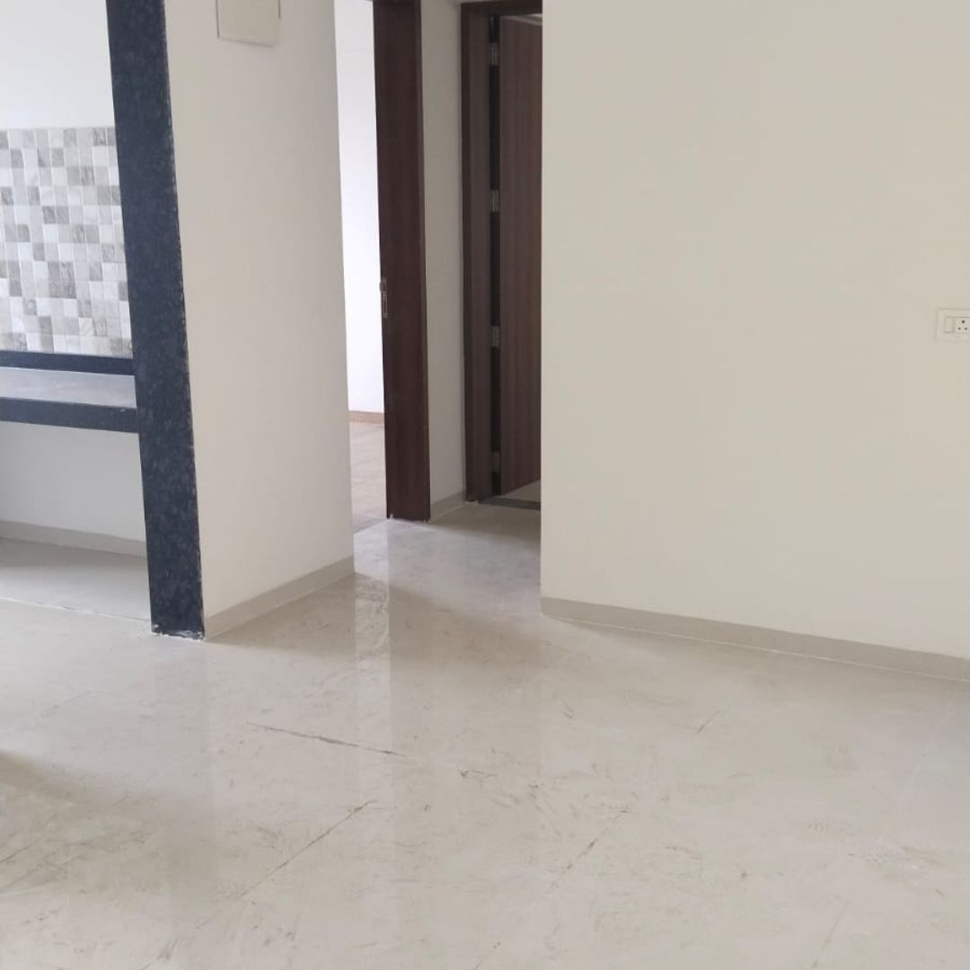 Spacious living room in a ready possession 2 BHK flat at Spine Road, Moshi